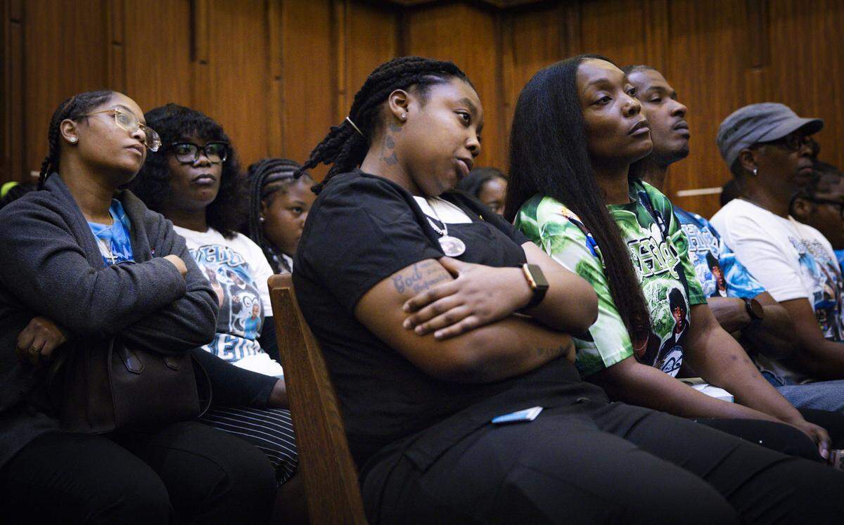 Yahkeim “Keimo” Lollar’s older sister, center, and mother, Nathalie Jean, and father Darveed Lollar Sr, right, attend the pre-trial hearing of Jahara Malik, who is charged with manslughter for the stabbing death of Lollar on Thursday, Feb. 6, 2025, at the Richard E. Gerstein Justice Building in downtown Miami. Lollar’s family was able to speak as to why Malik’s pre-trial detainment should be stricter.